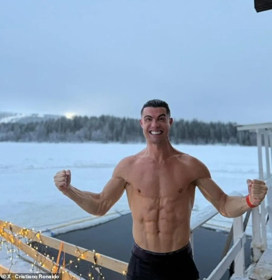 Cristiano Ronaldo strips down to his shorts in the snow in Lapland